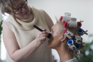 Kerrie Bailey (HMU) applying the finishing touches of make-up