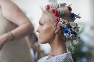 Profile of model with hair rollers