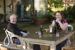 Joel and Nadia relax in the back yard of the farm house