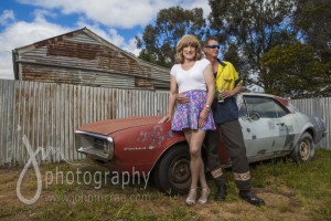 Denise and Greg in front of the "Firebird" and corrugated iron for days....